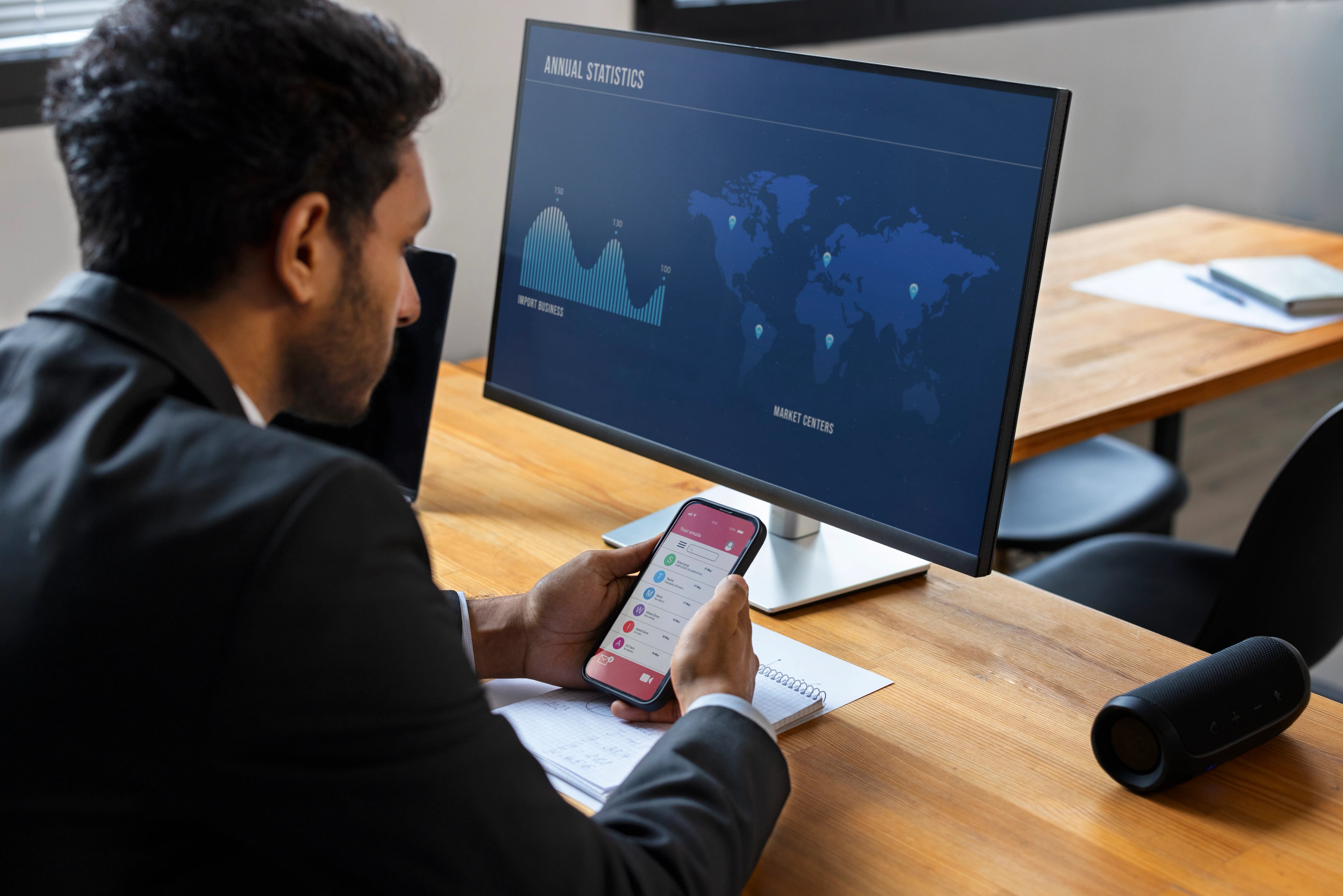 Business person looking finance graphs 1