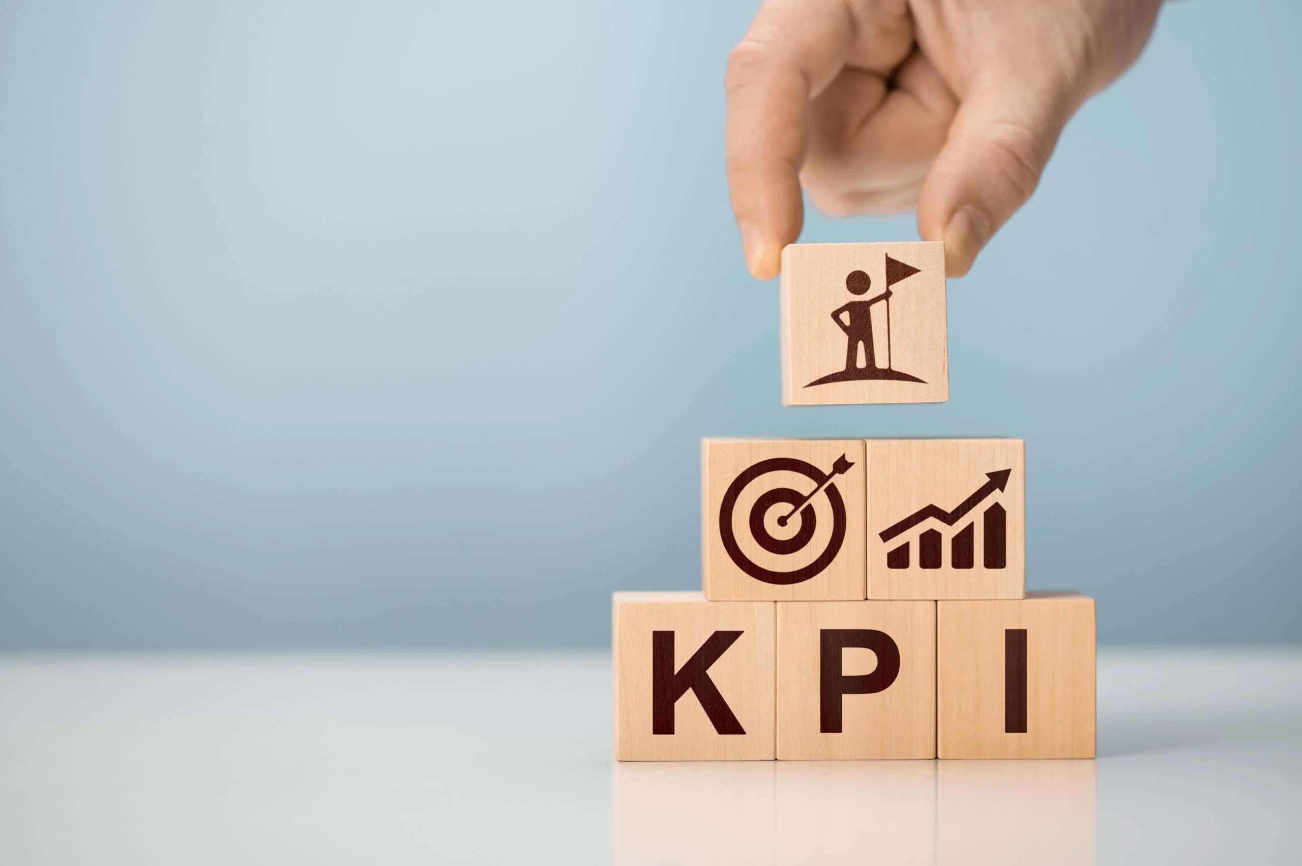 kpi-key-performance-indicator-businessman-holds-cube-with-kpi-kpi-key-performance-indicator-increase-optimisation-business-business-planning-measure-success-target-achievement-scaled